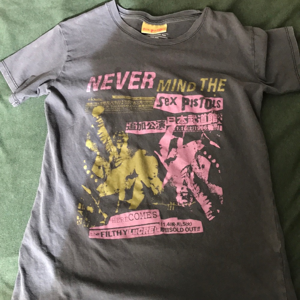 Sex Pistols graphic tee on charcoal shirt